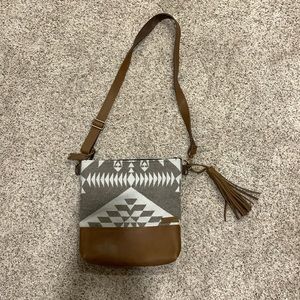 Leather bottom cross body